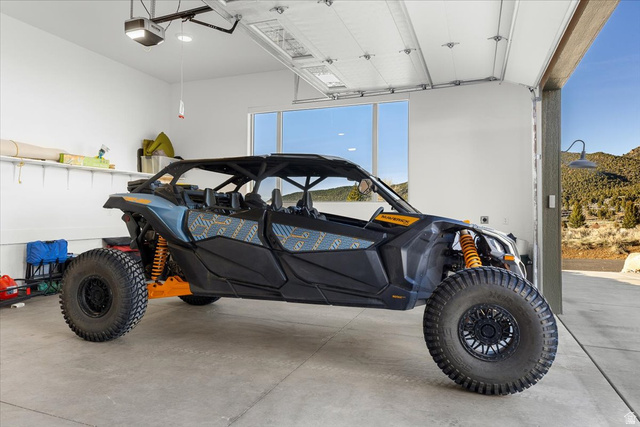 1210 East Bristle Cone Road Pine Valley, UT 84781 - Photo 31 of 54 Double-car garage bay with Can-Am ATV