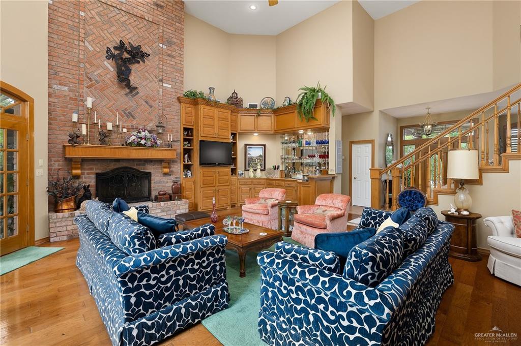 27603 Palo Verde Road San Benito, TX 78586 - Photo 7 of 45 a outdoor living space with furniture and a fireplace