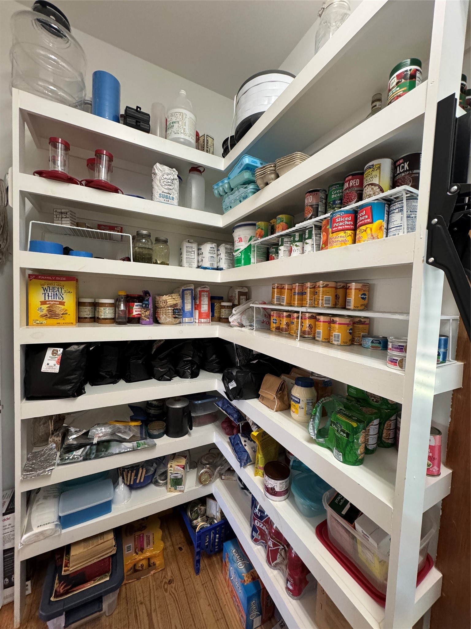 55 Lake Road Huntsville, TX 77320 - Photo 28 of 50 This pantry layout provides ample storage and easy accessibility, perfect for an efficient kitchen setup.