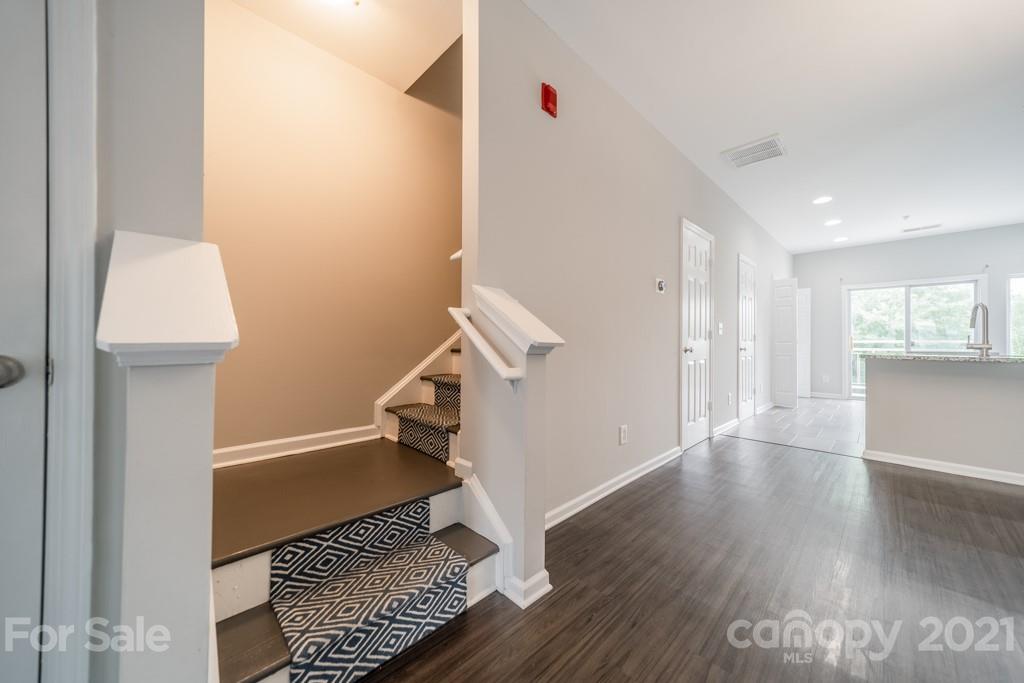 632 Raphael Place Charlotte, NC 28205 - Photo 20 of 37 a view of entryway with wooden floor