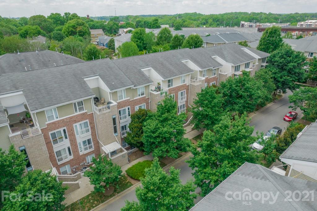 632 Raphael Place Charlotte, NC 28205 - Photo 6 of 37 an aerial view of multiple houses with yard