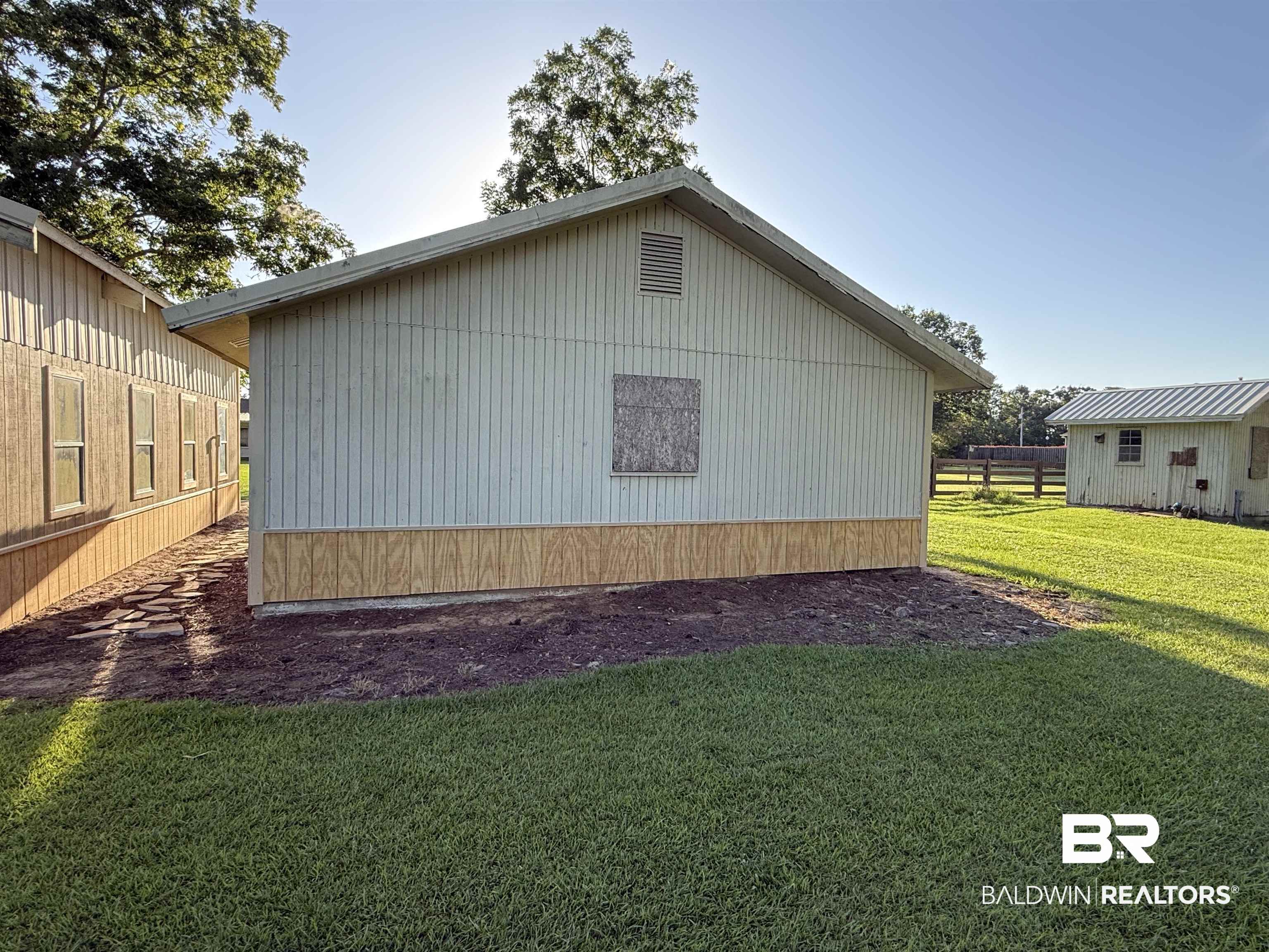 22810 Ard Road Robertsdale, AL 36567 - Photo 58 of 65 View of home's exterior with an outbuilding