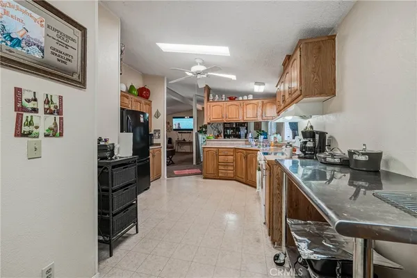 a kitchen with counter top space cabinets and stainless steel appliances