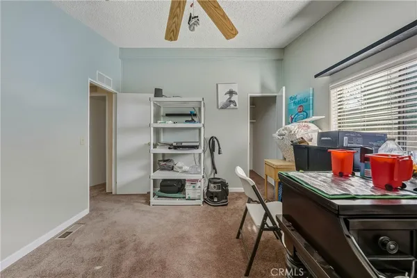 a view of a workspace with furniture