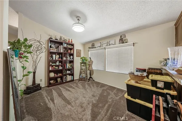 a bedroom with furniture and a bed