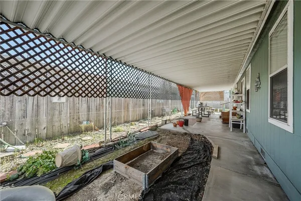 a view of a backyard with a patio