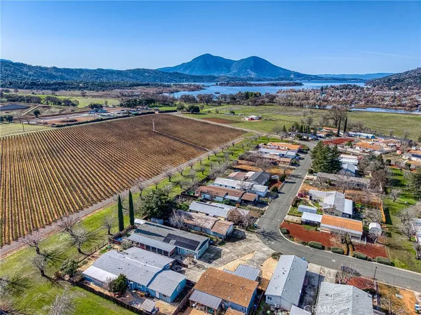 an aerial view of residential houses and outdoor space