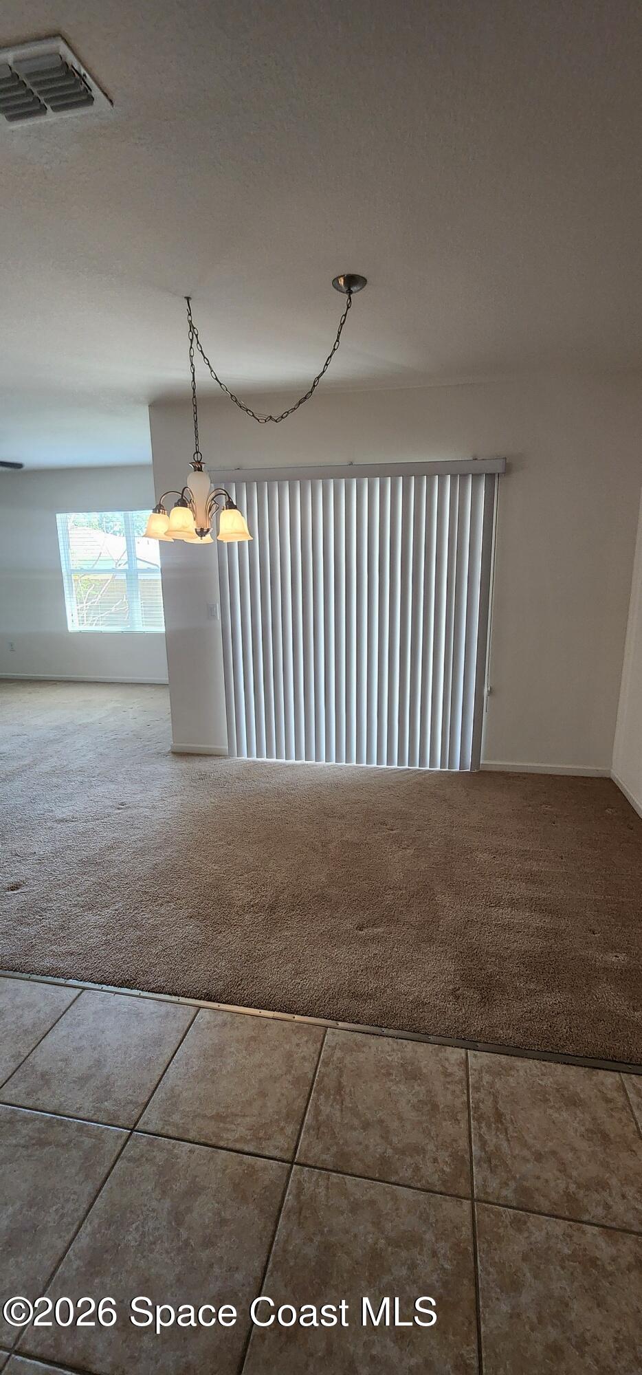 1957 Elkins Point Melbourne, FL 32935 - Photo 15 of 27 a view of staircase with white walls