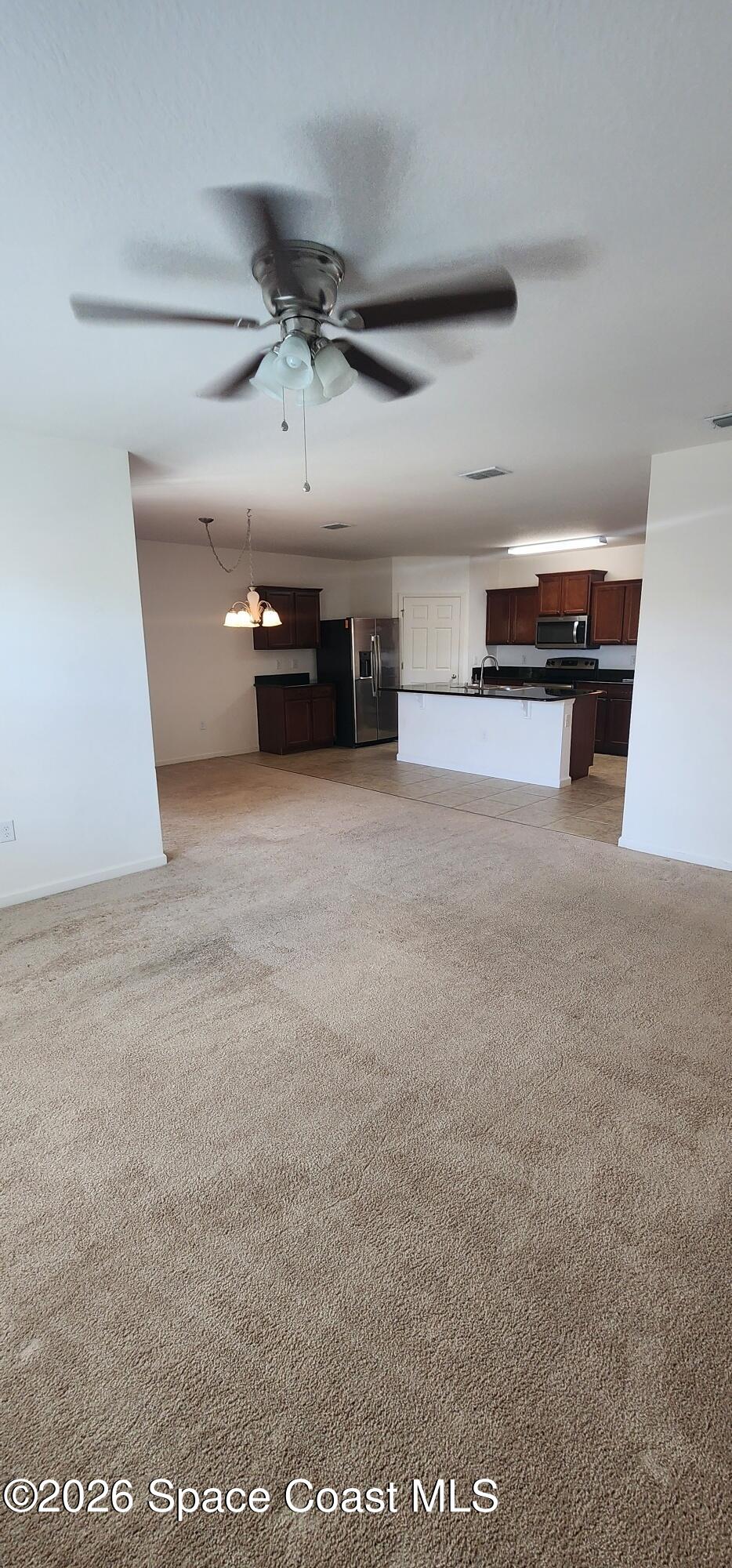 1957 Elkins Point Melbourne, FL 32935 - Photo 18 of 27 a view of a garage