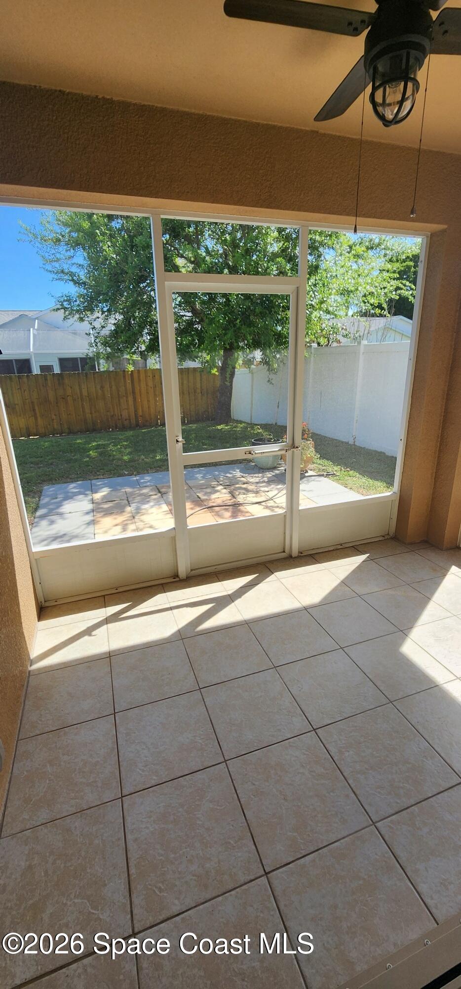 1957 Elkins Point Melbourne, FL 32935 - Photo 25 of 27 a view of a floor to ceiling window and an outdoor view
