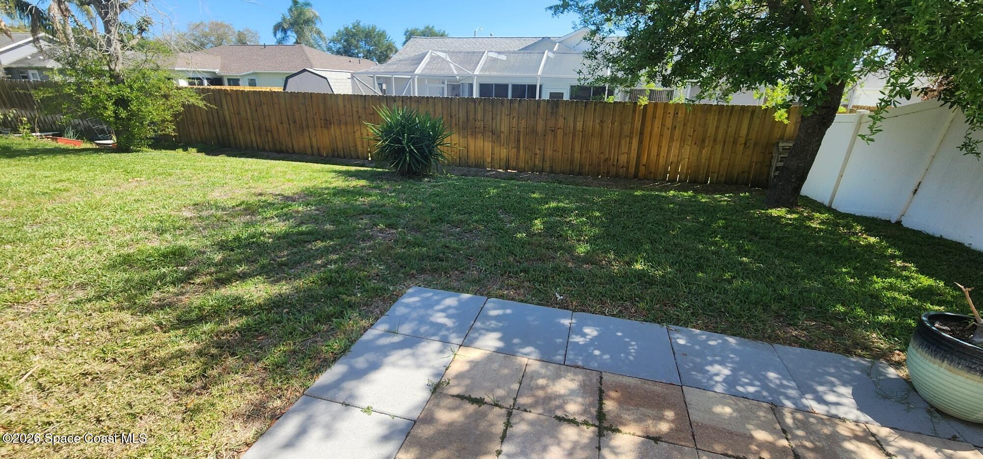 1957 Elkins Point Melbourne, FL 32935 - Photo 26 of 27 a view of a backyard with pathway