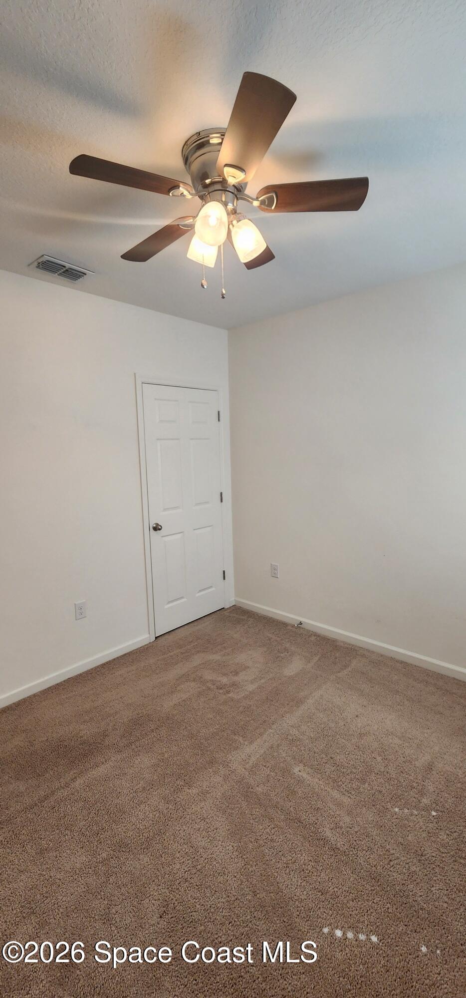 1957 Elkins Point Melbourne, FL 32935 - Photo 7 of 27 a view of an empty room