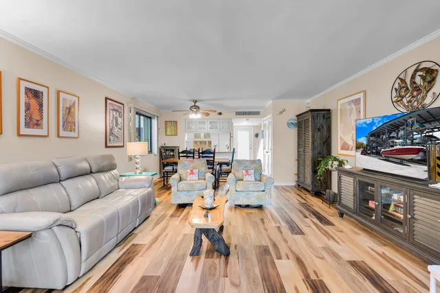 a view of entryway with stairs and front door