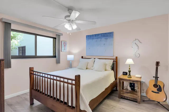 a view of a yard with flower plants