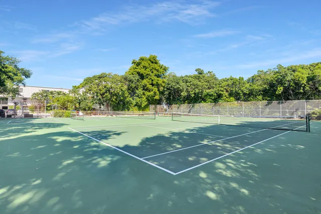 a view of a street with cars