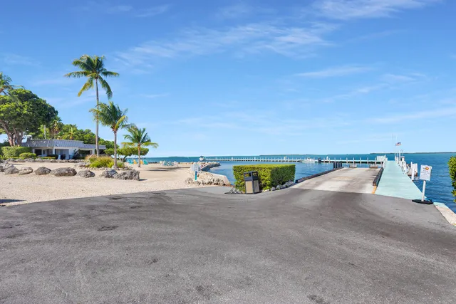 a view of a city with lawn chairs and a big yard