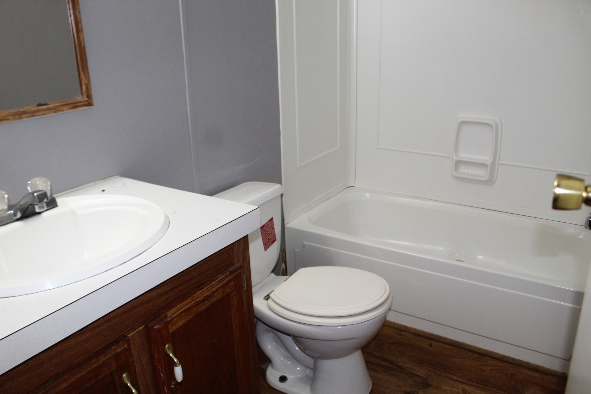 5453 Awalt Road Tullahoma, TN 37388 - Photo 11 of 19 a bathroom with a sink a toilet and bathtub