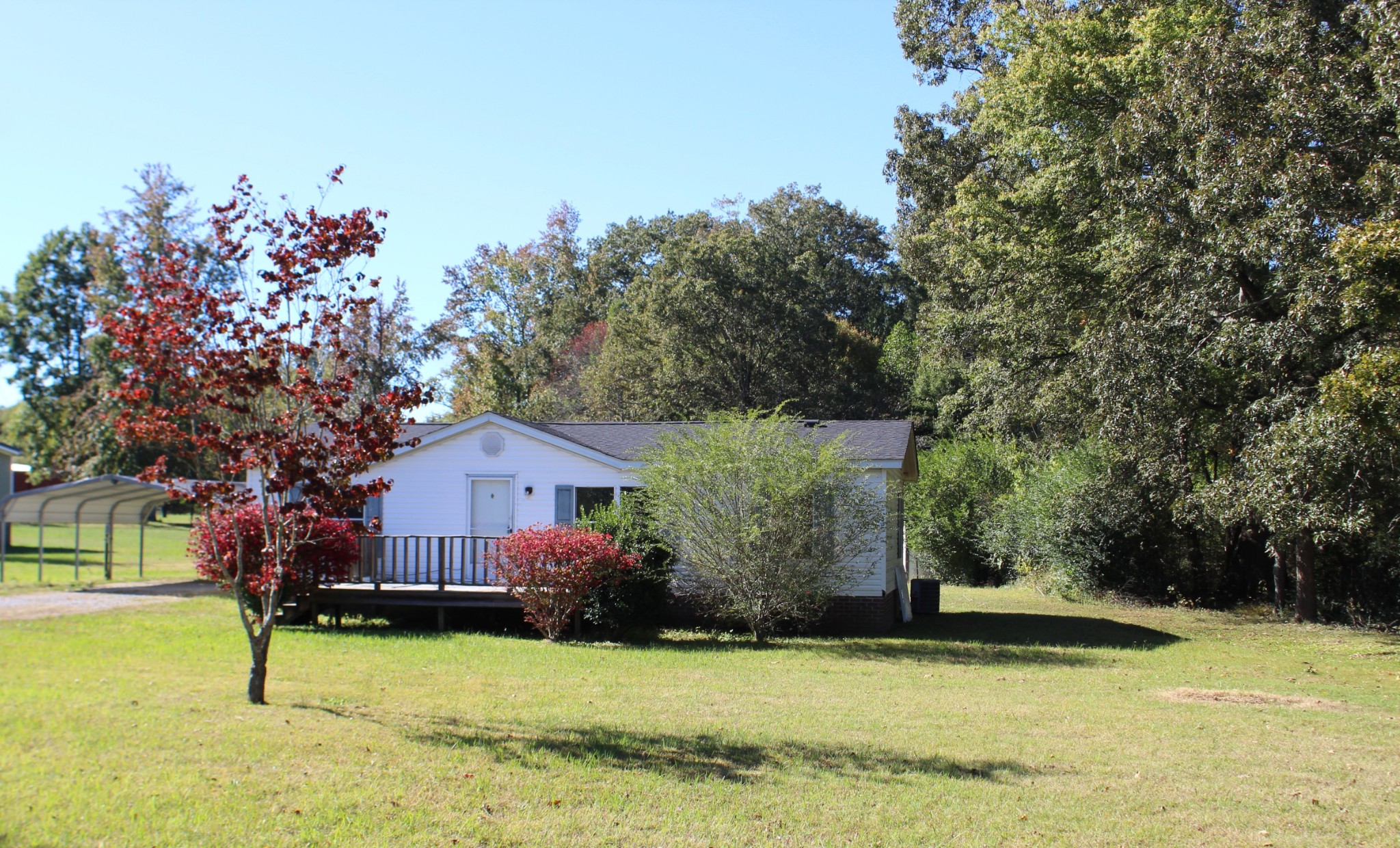 5453 Awalt Road Tullahoma, TN 37388 - Photo 4 of 19 a view of a house with a swimming pool