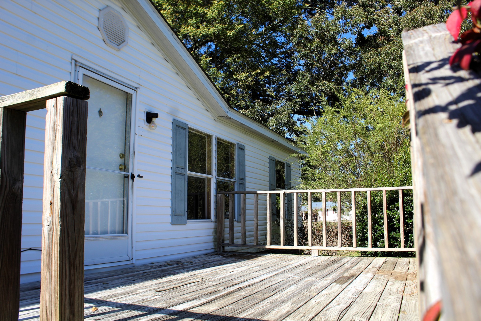 5453 Awalt Road Tullahoma, TN 37388 - Photo 6 of 19 a balcony with wooden floor and fence