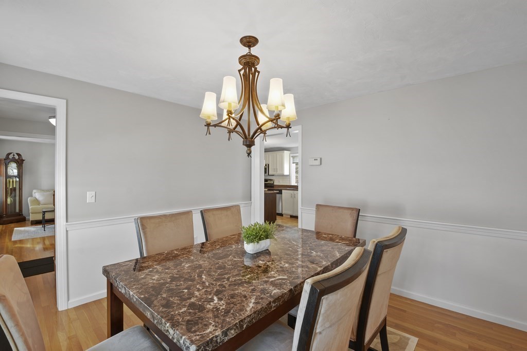 54 Carroll Hill Road Charlton, MA 01507 - Photo 11 of 30 a view of a dining room with furniture and wooden floor