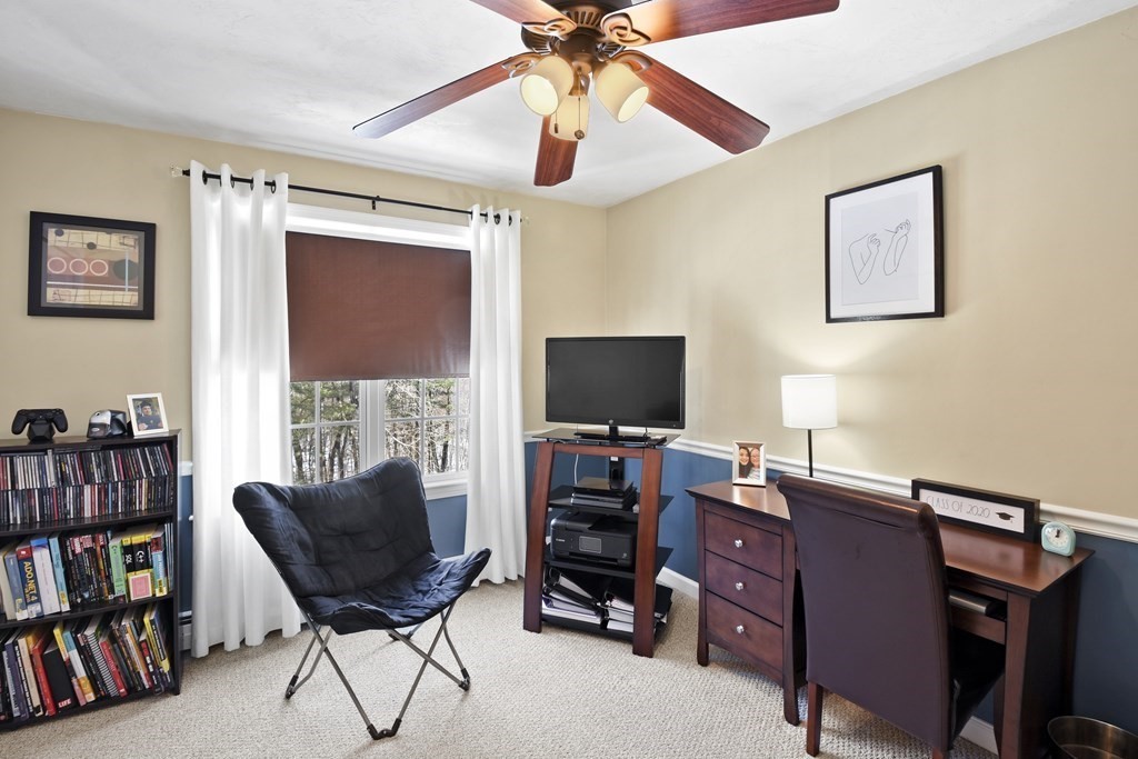 54 Carroll Hill Road Charlton, MA 01507 - Photo 22 of 30 a view of a livingroom with a bookshelf