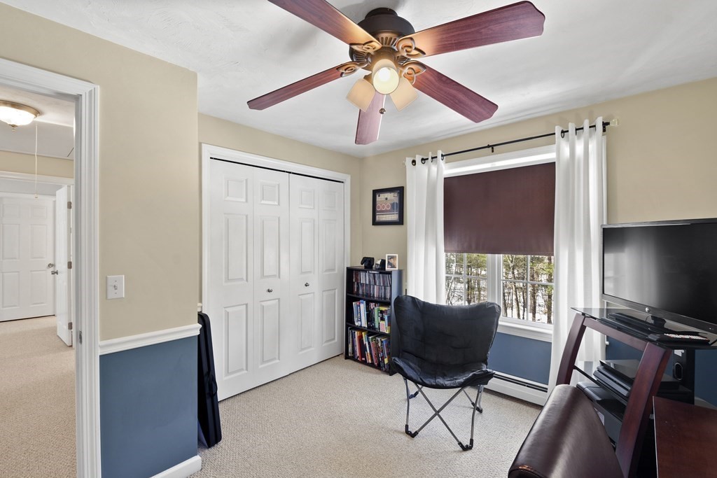 54 Carroll Hill Road Charlton, MA 01507 - Photo 23 of 30 a view of a livingroom with furniture and a window