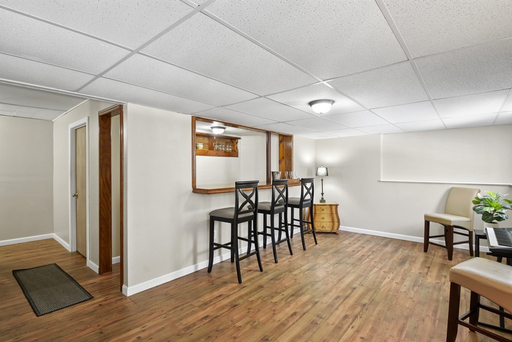 54 Carroll Hill Road Charlton, MA 01507 - Photo 25 of 30 a view of a room with furniture and wooden floor