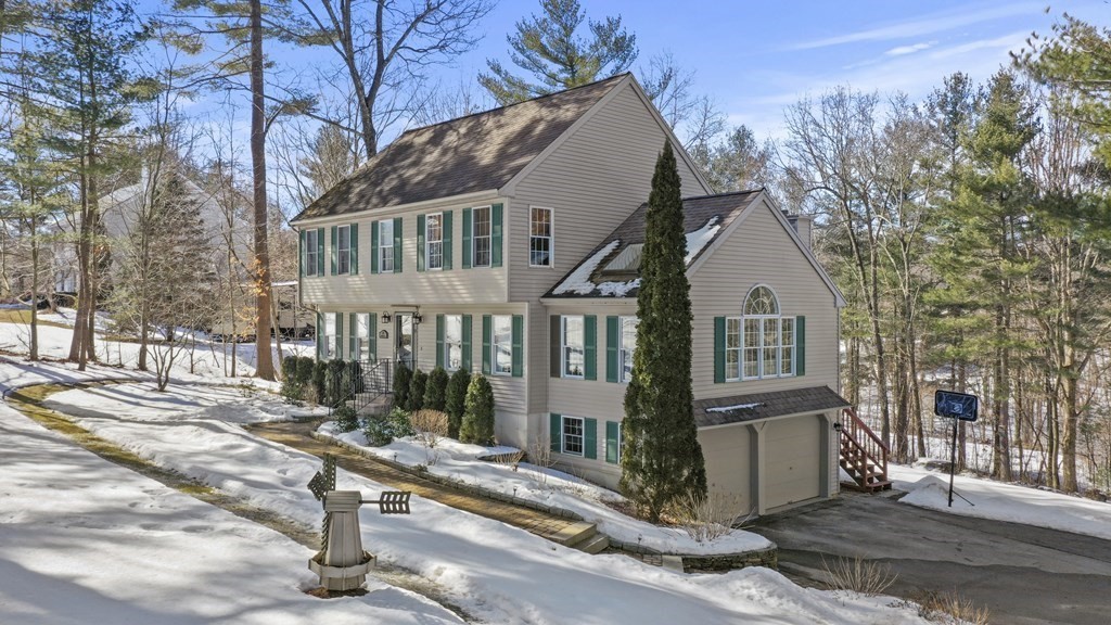 54 Carroll Hill Road Charlton, MA 01507 - Photo 28 of 30 a front view of a house with a tree