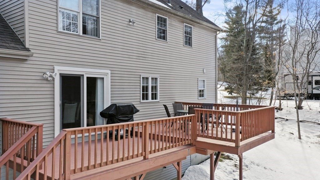 54 Carroll Hill Road Charlton, MA 01507 - Photo 30 of 30 a view of a wooden deck with furniture