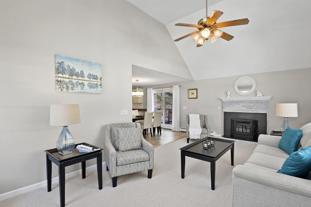 54 Carroll Hill Road Charlton, MA 01507 - Photo 3 of 30 a living room with furniture and a fireplace