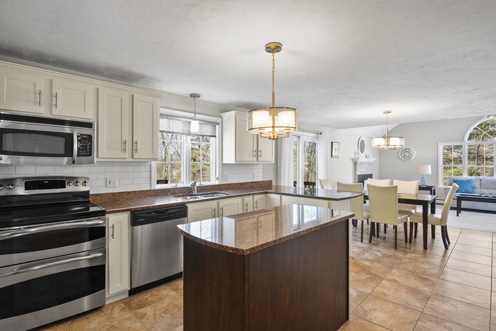 54 Carroll Hill Road Charlton, MA 01507 - Photo 7 of 30 a large kitchen with lots of counter top space