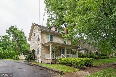 front view of a house with a small yard