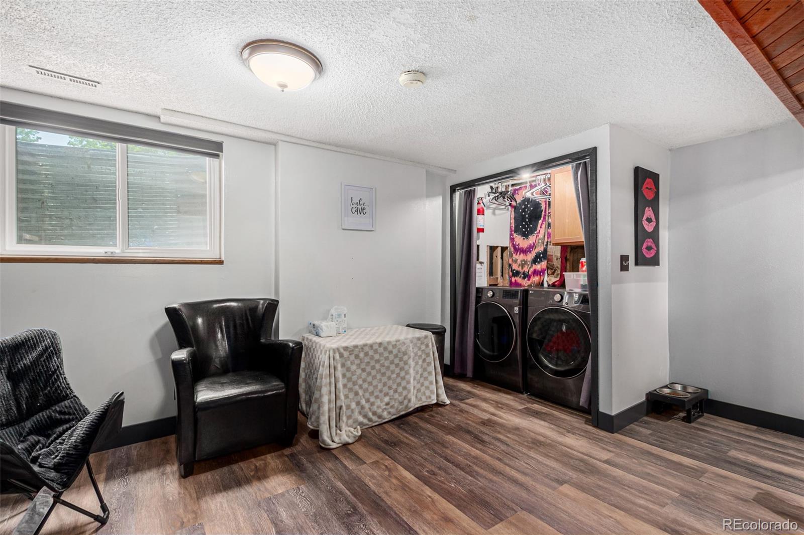 8140 West 90th Avenue Westminster, CO 80021 - Photo 32 of 47 a bedroom with furniture and a window