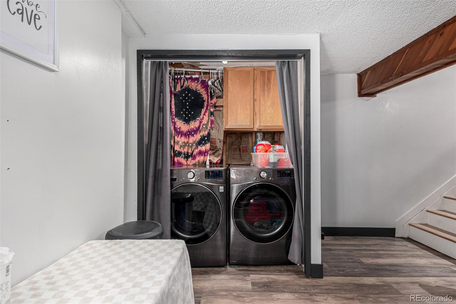 8140 West 90th Avenue Westminster, CO 80021 - Photo 33 of 47 a view of livingroom with washer and dryer