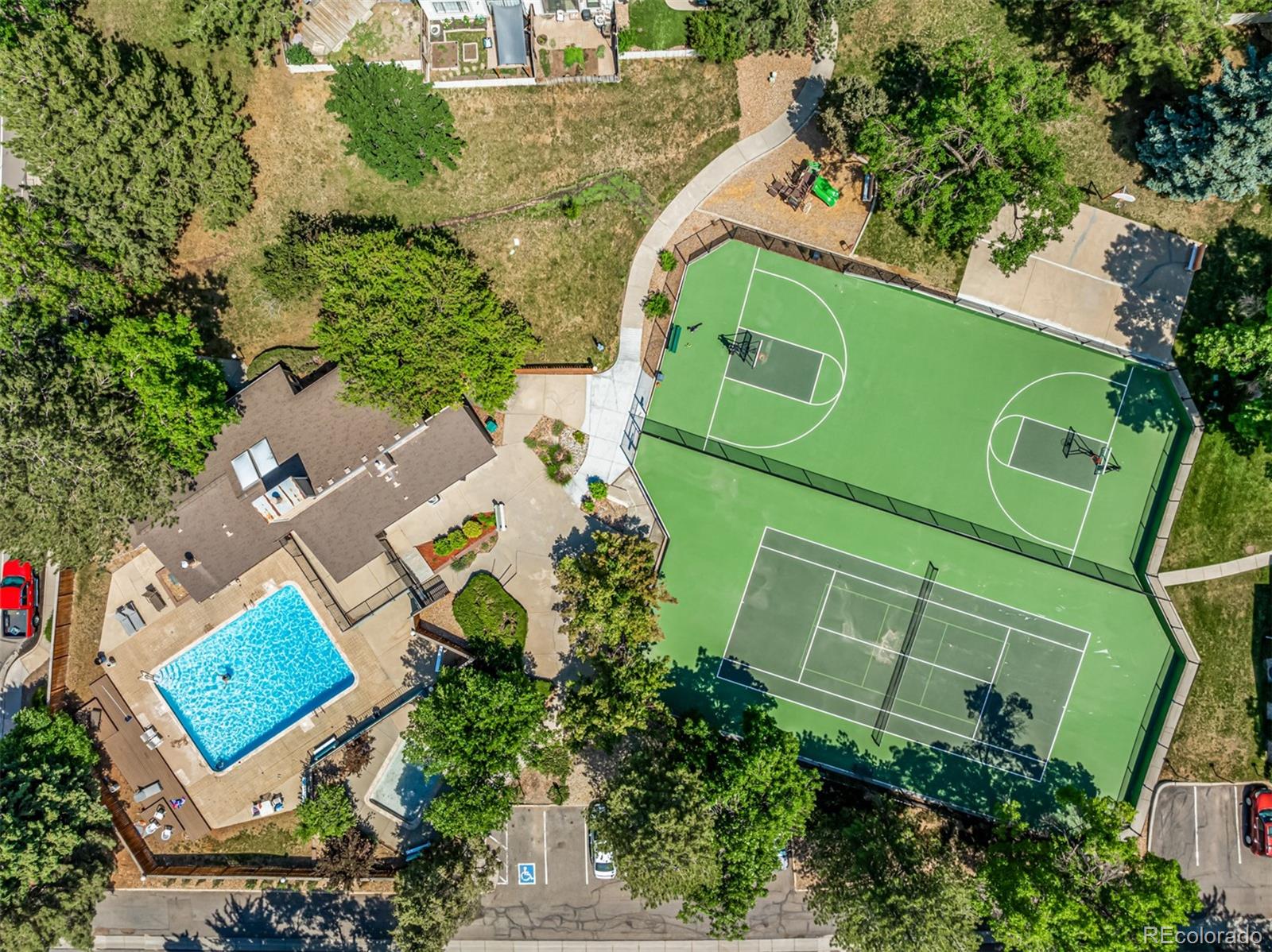 8140 West 90th Avenue Westminster, CO 80021 - Photo 46 of 47 an aerial view of a house with a garden and swimming pool