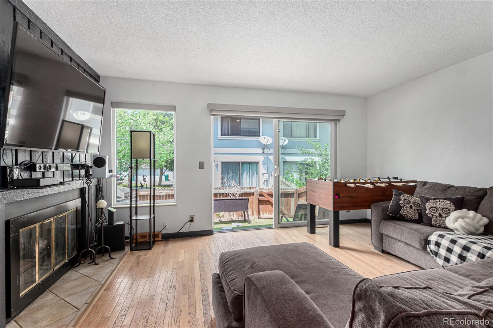 8140 West 90th Avenue Westminster, CO 80021 - Photo 5 of 47 a living room with furniture and a large window