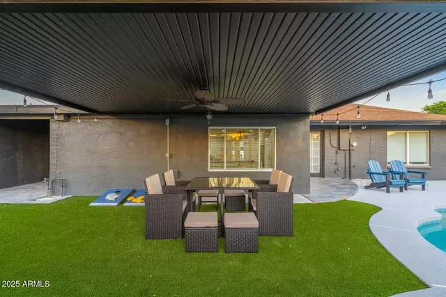 a outdoor living space with furniture and garden view