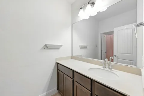 a room with a bed and a window