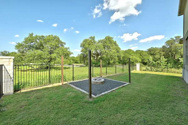 a view of a garden with a slide