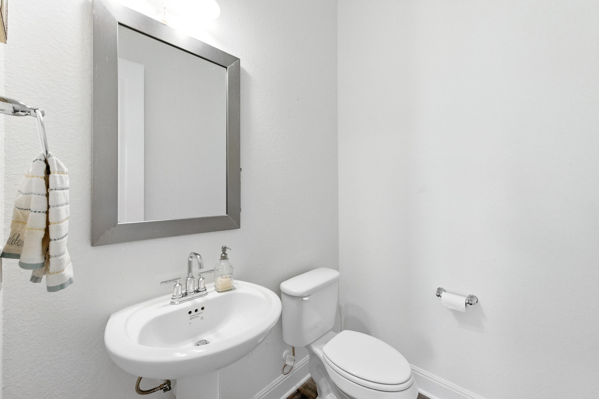 216 Tovas Secret Cove Georgetown, TX 78628 - Photo 34 of 39 Bathroom featuring toilet and a sink