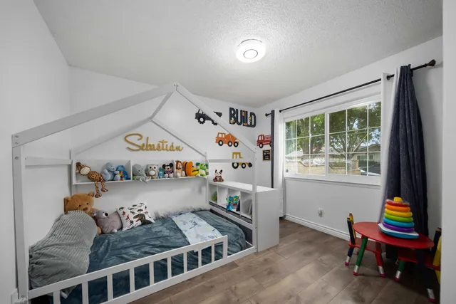 a room with furniture and musical instruments