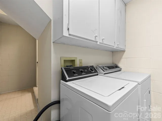 a stove top oven sitting inside of a kitchen