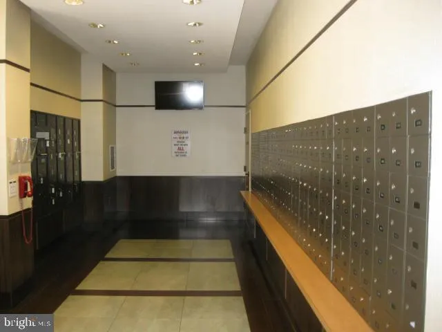 a bathroom with a glass shower door and a glass door