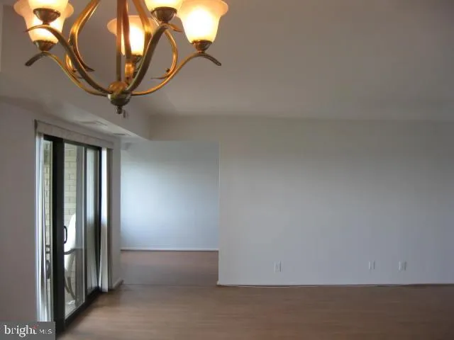 a kitchen with stainless steel appliances a refrigerator and a stove
