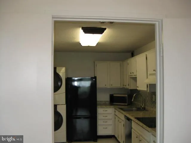a view of hallway with wooden floor