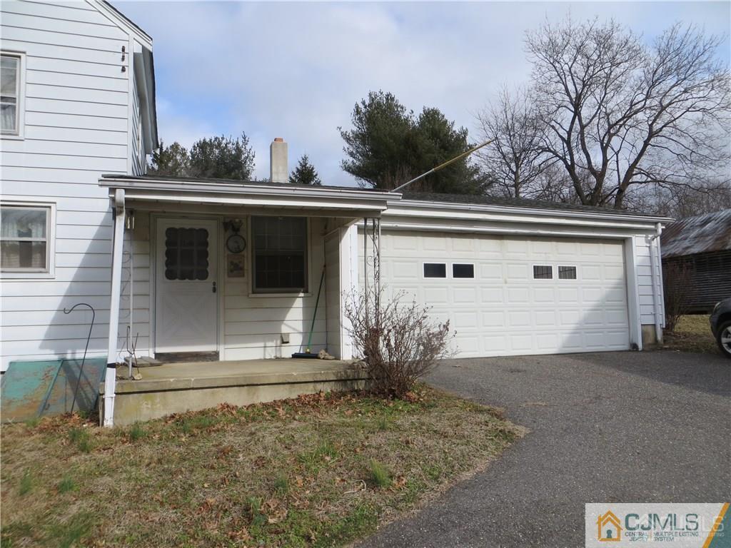 29 Chest-crosswicks Road Chesterfield, NJ 08515 - Photo 3 of 57 a view of a house with a large window and potted plants
