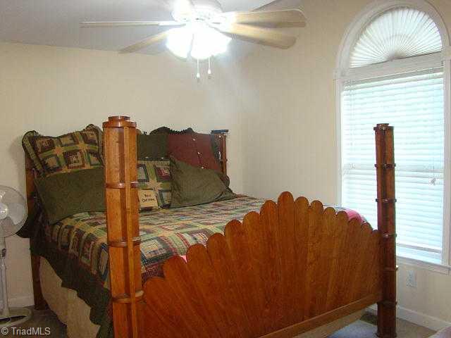 181 Morningside Road Randleman, NC 27317 - Photo 10 of 16 Master Bedroom. Walk-in closet & paladium window