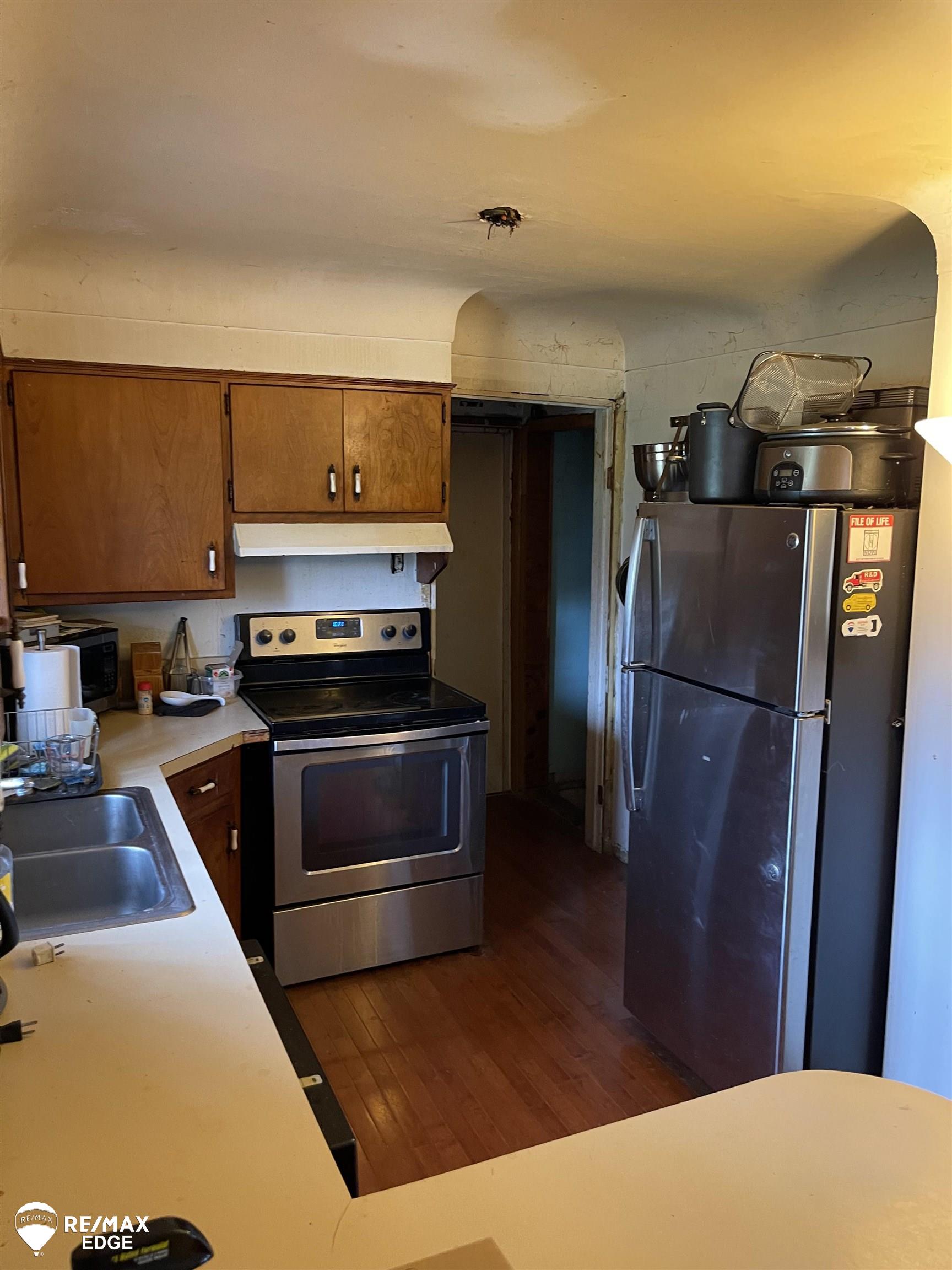 4124 Flushing Road Flint, MI 48504 - Photo 10 of 23 50136175-cf32c52a-5410-4c7d-9477-80374f0bb032.JPG