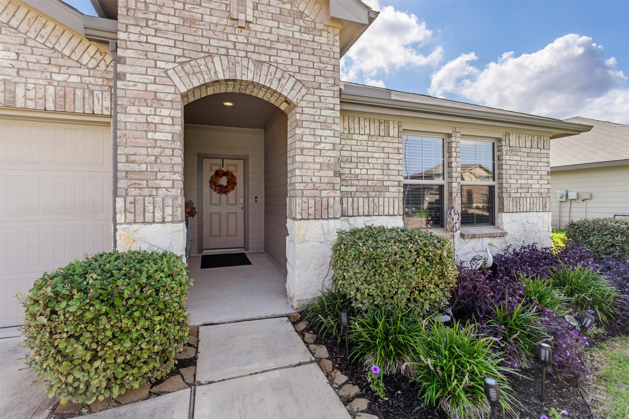 1711 Martin Spring Lane Rosenberg, TX 77469 - Photo 19 of 24 Covered front entry with classic brick detailing and great curb appeal.