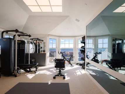 a view of a room with gym equipment